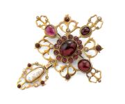 An impressive Medieval style 9ct gold cross pendant/brooch, set with garnets and pearls, custom made by SARGISONS&nbsp;of Hobart, 20th century, stamped "9ct", 9cm high, 22.91 grams total