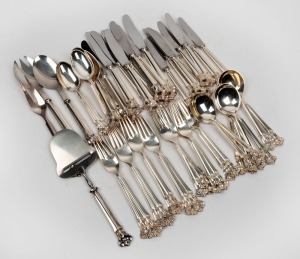 A vintage Danish sterling silver cutlery set for eight places, with additional serving utensils and cheese slicer, 20th century, (52 items), stamped "RAADVAD DANISH STERLING", 1560 grams silver weight not including knives and servers