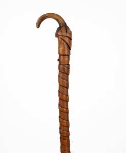 An antique Irish walking stick with horn handle, twisted timber shaft with stippled decoration and ownership inscription "K.B. 1807", and original steel ferrule, 87cm high