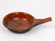 An antique Dutch terracotta cooking pan, 17th century; together with a Siegburg stoneware jug, 15th century, (2 items), the jug 25cm high - 7