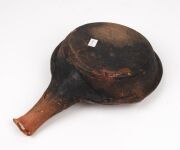 An antique Dutch terracotta cooking pan, 17th century; together with a Siegburg stoneware jug, 15th century, (2 items), the jug 25cm high - 8
