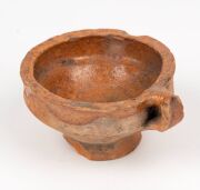 An antique Dutch pottery cup with trailing slip glaze; together with a similar undecorated example, 17th century, (2 items) the larger 6.5cm high, 12.5cm wide - 4