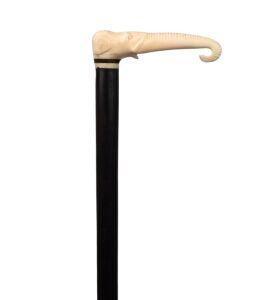 An antique walking stick with carved ivory elephant head handle, ebony shaft and brass ferrule, 19th century, ​​​​​​​86cm long