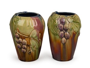 ALLAN JAMES rare pair of pottery vases with applied grapes and leaves, incised "A. James, 1933", 14cm high.