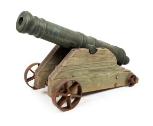 V.O.C. DUTCH EAST INDIA COMPANY antique bronze cannon, stamped "V.O.C." with Amsterdam foundry mark "A", circa 1750. Verified by the Fremantle Maritime Museum in Western Australia. The cannon is accompanied by a selection of carriage parts which were gifted to the vendor by the Fremantle Maritime Museum. 128cm long