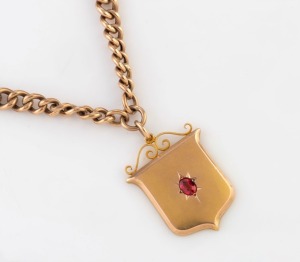 WILLIS & SONS of Melbourne, antique 9ct gold shield shaped fob, set with a red stone, suspended on a 9ct rose gold double fob chain, 19th/20th century, stamped "9.W." with unicorn mark, 22cm long, 21.9 grams total