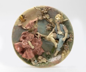 GWEN WATSON pottery plaque with applied figures, butterfly, lamb and blossom tree, ​​​​​​​24cm diameter