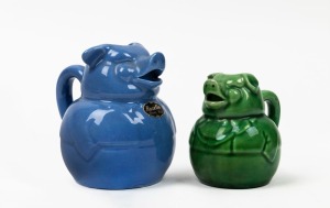 Two ROZELLE pottery pig cream jugs, one with original foil label, ​​​​​​​10cm and 7.5cm high