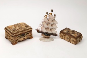 An Australian folk art shell ship ornament, together two shell decorated boxes, 20th century, (3 items), the ship 21cm high
