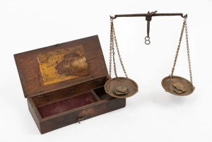 Antique gold scales with lozenge weights in oak case, bearing paper label inside the lid "W. & T. AVERY", 19th century, 17.5cm wide