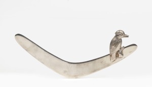 An Australian silver boomerang letter opener with applied kookaburra decoration, 20th century, stamped "STG. SIL.", 13cm wide, 28 grams