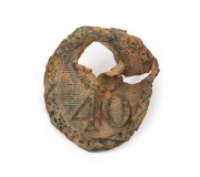 EUREKA STOCKADE: 40th Regiment of Foot hat badge (Albert pattern). Missing crown top. Note: This piece was discovered by a metal detectorist&nbsp;in the Victorian Goldfields. Relic condition with what appears to be a musket ball hole. Rare. 7cm high.