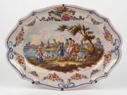 An antique&nbsp;French majoilca meat platter with hand-painted country scene, signed lower right "Berghem, 1767", 51cm wide