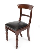 A set of six Colonial Australian cedar spade back dining chairs with faceted tapering legs and drop in black leather upholstered seats, circa 1845 - 2