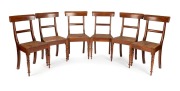 A set of six antique Australian cedar spade back dining chairs with turned legs and rattan seats, early to mid 19th century, ​​​​​​​92cm high