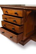 An impressive antique Australian library partners desk with D-ended inset writing surface and&nbsp;crossbanded edge. The pedestals with four graduated drawers to each side standing on a recessed plinth with footrest, circa 1880. Full cedar construction. 66cm h - 2