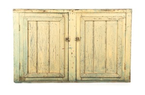 An antique Australian two door cabinet with original green and yellow painted finish, South Australian origin, 19th century, 96cm high, 145cm wide, 57cm deep