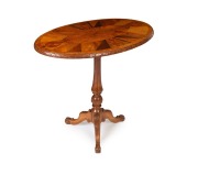 An antique New Zealand specimen wood oval tilt-top occasional table with carved tripod base, 19th century, 70cm high, 79cm wide, 56cm deep - 2