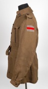 ERNEST&nbsp;ALBERT EPPLE, 1st. A.I.F. 11th FIELD ARTILLERY BRIGADE: WWI tunic with Rising Sun lapel badges and patches and original Turkish-knot style buttons. Epple was in the motor transport battalion. The tunic is made from barathea material and was probab - 4