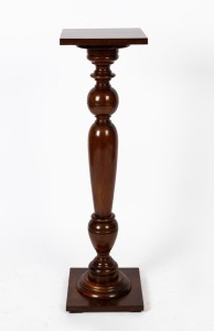 An Australian blackwood pedestal with square top, supported by a vase and baluster shaped column, circa 1920, 104cm high, 30cm wide, 29cm deep