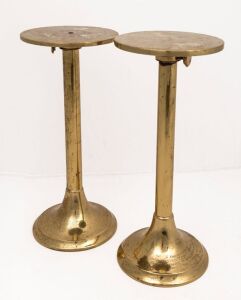 Two antique brass adjustable shop display stands, 19th century, the larger 33cm high