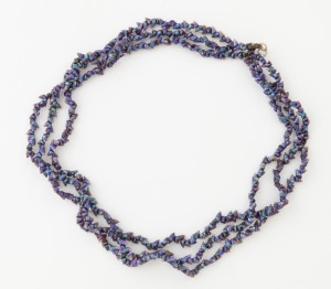 A triple strand Mariner shell bead necklace, 51cm long