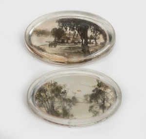 A pair of antique glass paperweights with photographic Australian scenes, including paddle steamer and a coastal scene, 19th/20th century, 11cm wide each
