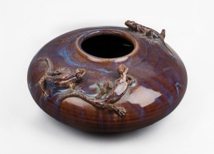 ROBYN RESSOM purple glazed pottery vase with three applied lizards, artist monogram to base, 11cm high, 29cm wide