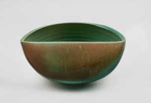 GREG DALY green glaze studio pottery bowl, signed "Daly, '05", 11cm high, 25cm wide