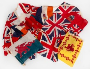 WORLD WAR ONE ERA bunting consisting of patriotic flags of the Allies, mostly stitched together in strips for display outside shops and home. Comprising of two strips of 8, and a pair, all marked "British Made", each flag is approx. 22 x 29cm. (18 flags).