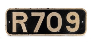 LOCOMOTIVE NUMBER PLATE "R709" painted cast iron, 20th century. Note: From the last batch of 70 passenger locos imported for the Victorian Railways from Glasgow, 1951-53. 28 x 81cm