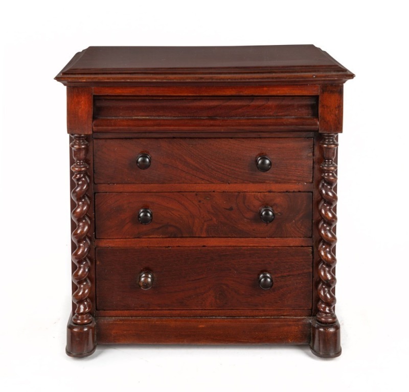 An antique Australian cedar apprentice chest of four drawers with full barley twist columns, 19th century, 37cm high, 37cm wide, 24cm deep