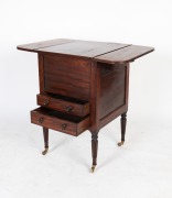 An antique Colonial gentleman's cedar washstand with drop sides and fluted legs, early 19th century. Origin unknown. Note: Several alterations visible. 82cm high, 53cm wide (closed), 58cm deep - 2