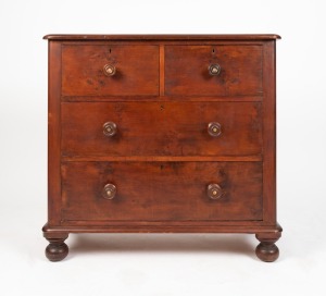 An antique Australian huon pine chest of four drawers of diminutive proportions, turned wooden draw knobs standing on bun feet, Tasmanian origin, circa 1880, 90cm high, 97cm wide, 46cm deep