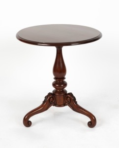 An antique Australian blackwood wine table with baluster turned column, cabriole scroll legs with floral carving to the knee and associated blackwood top, circa 1880, 66cm high, 61cm diameter