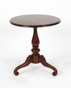 An antique Australian blackwood wine table with baluster turned column, cabriole scroll legs with floral carving to the knee and associated blackwood top, circa 1880, 66cm high, 61cm diameter
