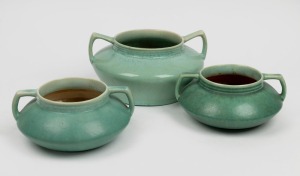 MELROSE WARE group of three green glazed pottery two handled mantle vases, stamped "Melrose Ware, Australian", the largest 14cm high, 26cm wide