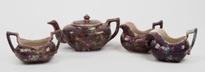 BENDIGO pottery teapot, sugar basin and two jugs, all with mottled pink and green sponge ware finish, (4 items), the teapot 10cm high, 20cm wide