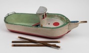 An Australian folk art hand-painted timber model boat, 20th century, ​​​​​​​70cm long