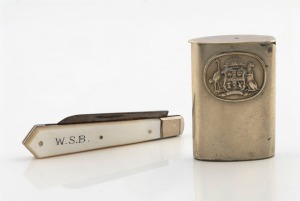 An antique silver plated pocket match vesta adorned with Australian coat of arms, together with an antique pearl handle pocket knife in box with Australian coat of arms, late 19th century, (2 items), the vesta 5cm high