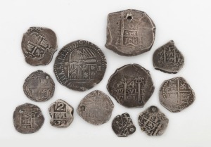 Twelve assorted antique Spanish pieces of eight silver coinage in varying states, 18th century, 90.3 grams total