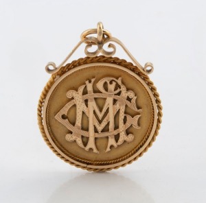 An antique 15ct gold football medallion, inscribed "Presented to M McGrath Sec Griffiths Dist. Football Club For Services Rendered Season 1921", 4.5cm high including bow, 11.6 grams