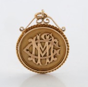 An antique 15ct gold football medallion, inscribed "Presented to M McGrath&nbsp;Sec Griffiths Dist. Football Club For Services Rendered Season 1921", 4.5cm high including bow, 11.6 grams