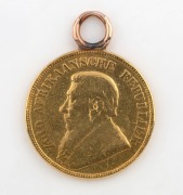 A South African one pond 22ct gold coin mounted as a pendant,&nbsp; 8.1 grams total&nbsp;