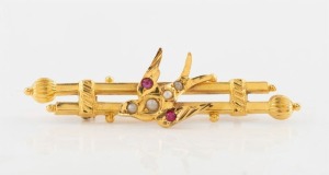 WILLIS & SONS of Melbourne antique 15ct gold bird brooch, set with seed pearls and red stones, 19th century, stamped "15" flanked by pictorial marks, 5cm wide, 3 grams 