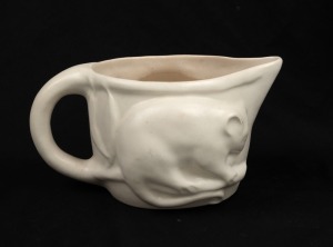 MELROSE WARE cream glazed possum jug, stamped "Melrose Ware, Australian", 11cm high