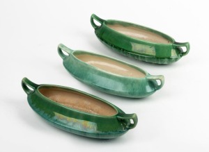 MELROSE WARE group of three green glazed pottery two handled flower troughs, stamped "Melrose Ware, Australian", 7.5cm high, 31cm wide