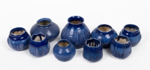 MELROSE WARE group of nine assorted blue glazed pottery vases, the largest 10.5cm high