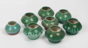 MELROSE WARE group of eight assorted green glazed pottery vases, some examples with brown highlights, the largest 8cm high