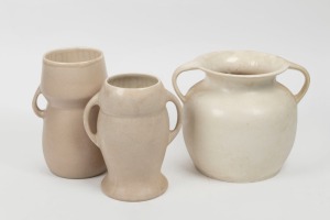 MELROSE WARE three two handled pottery vases glazed in cream and mushroom grey, stamped "Melrose Ware, Australian", the largest 21cm high